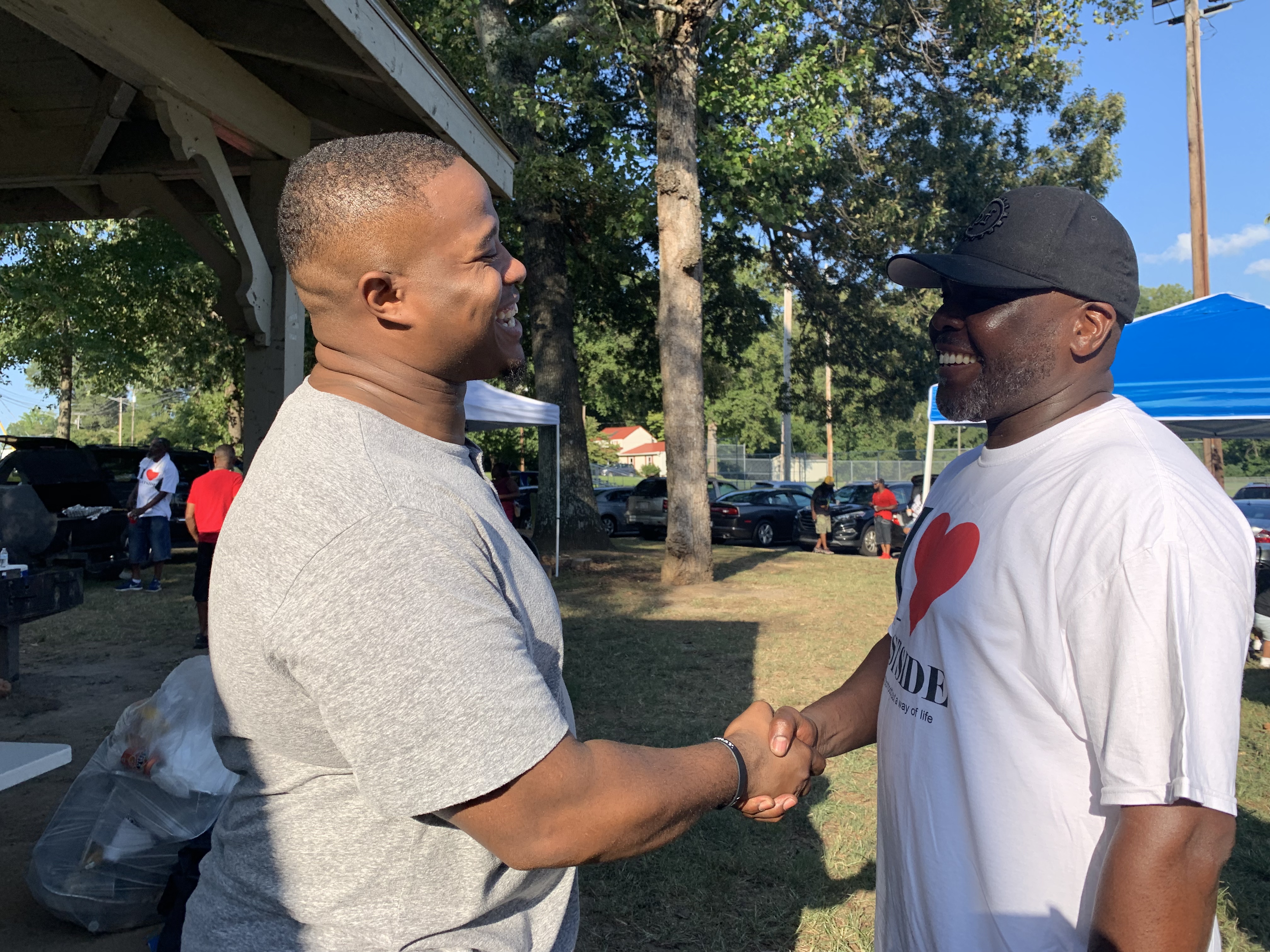 Handshake in park - photo